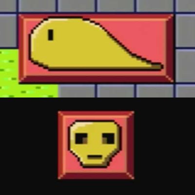 A slime spawning golden statue and a skull spawning golden statue on a red block
